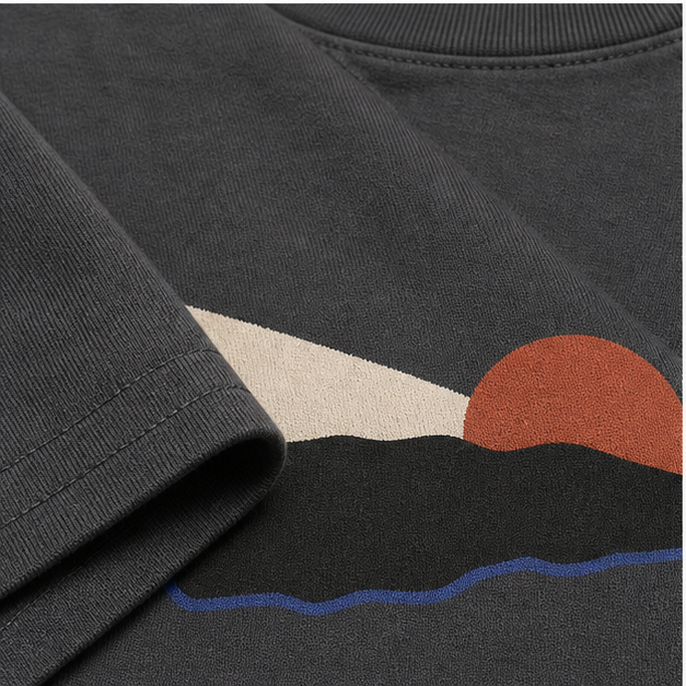 Close-up of Asphalt 6 oz Airlume cotton and matte horizon print