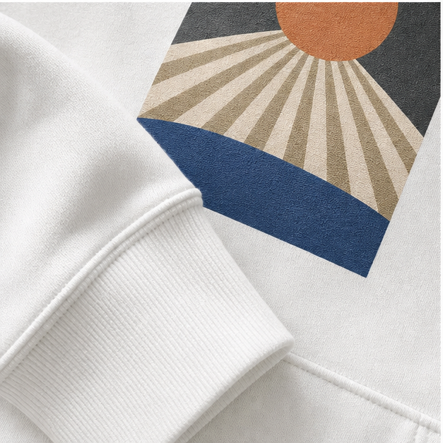 Close-up of White sponge fleece, ribbing and matte Daybreak print