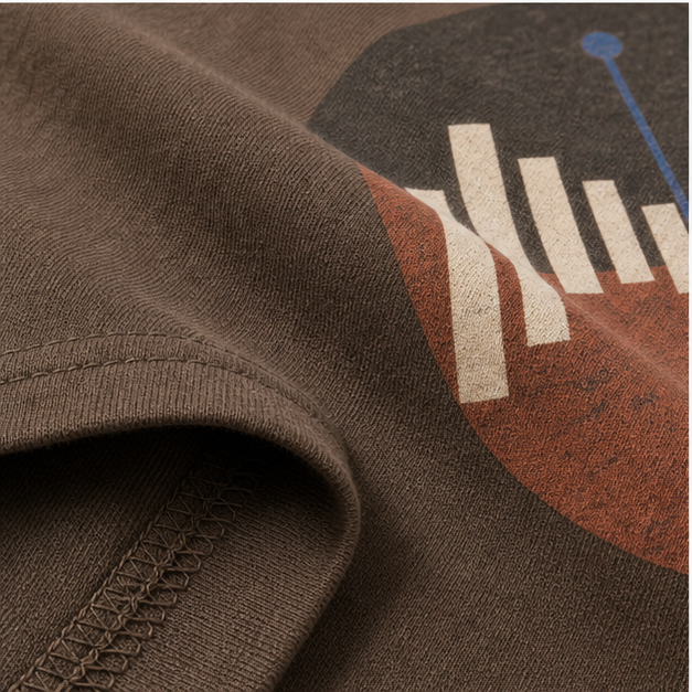 Close-up of Vintage Brown heavyweight Airlume cotton and matte print
