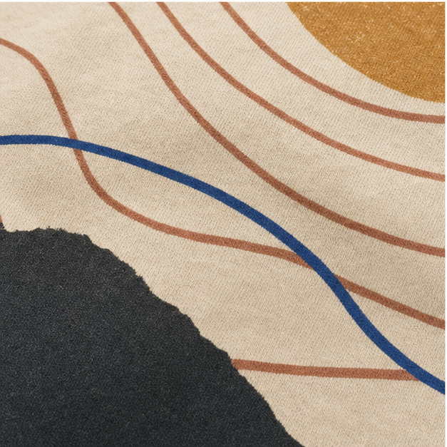 Close-up of Natural cotton knit and matte Sun Trace print